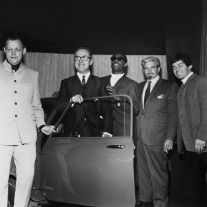 Stevie Wonder presents a “Motown Mini” to a British competition winner in London, 1969, alongside the company’s Phil Jones and Barney Ales and, at right, DJ Tony Blackburn. Courtesy of Barney Ales 